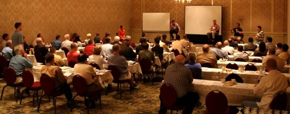 advisor_training A room full of Professionals in a training session
